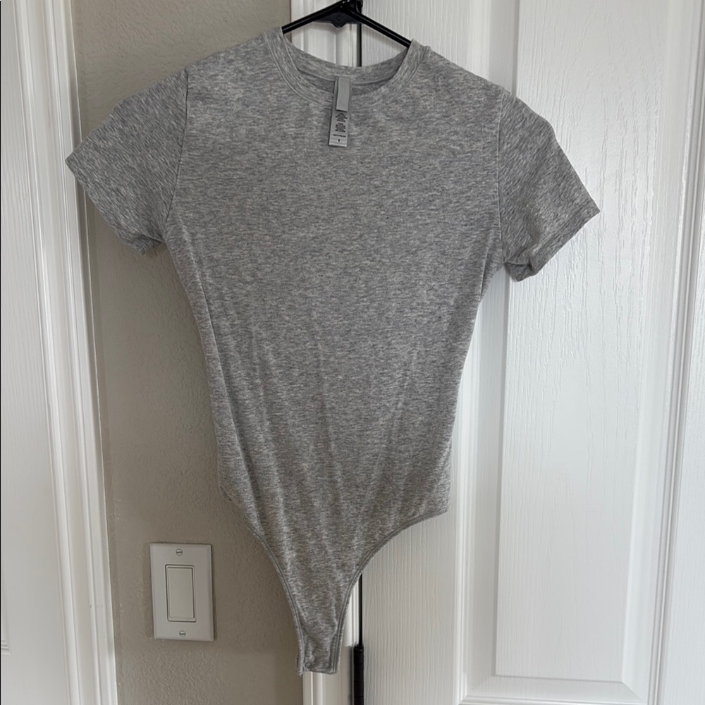 SKIMS Stretch Cotton Jersey T-Shirt
Gray Bodysuit